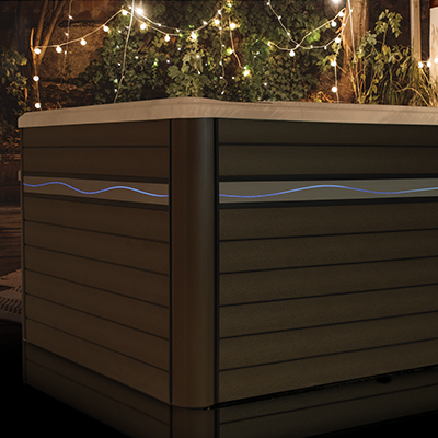 Side view of H2X Swimspa with wave light package
